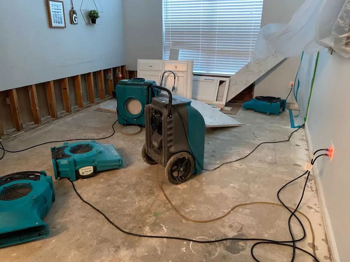 Dehumidifier in flood-cut room for Water Damage Restoration in Crookston